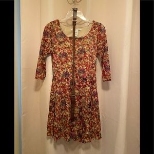 American Rag size medium dress. Belt, falls an inch above knee. Worn twice.